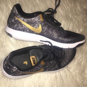 Black & Gold Nike Ultra Experience RN shoes